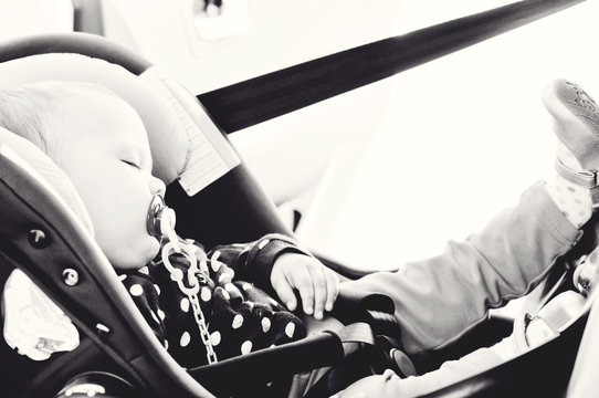 baby sleeping in car