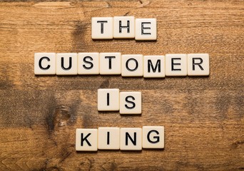 King. The Customer is King card with colorful background with