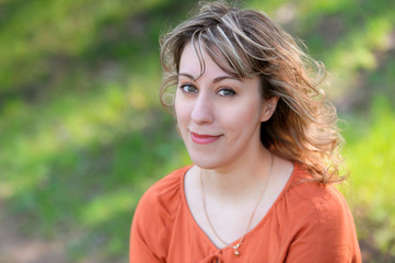 Fototapeta premium Portrait of beautiful girl in the spring garden