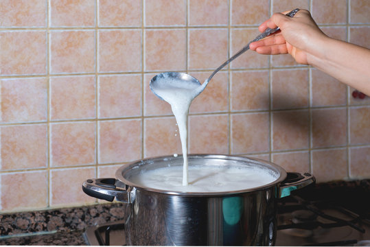 Pot Boiling Fresh Milk For Consumption