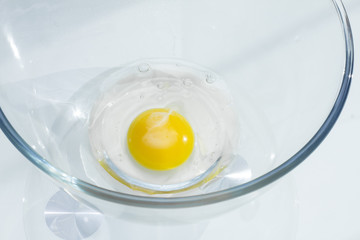Raw egg in a bowl
