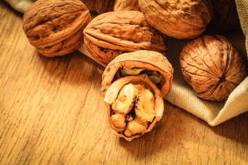 walnuts on rustic old wooden table