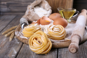 Raw homemade pasta and ingredients for pasta