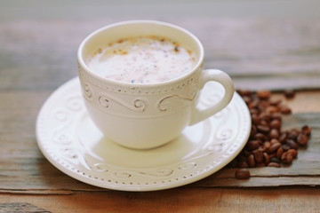 Cup of coffee on table close-up