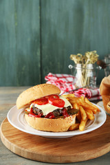Tasty burger and french fries