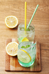 cold soft drink from apple syrup and mint