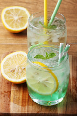 cold soft drink from apple syrup and mint