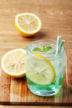 cold soft drink from apple syrup and mint