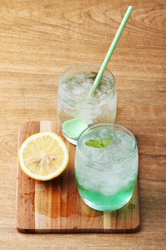 cold soft drink from apple syrup and mint