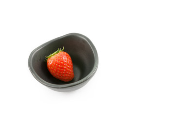 red strawberry on white background