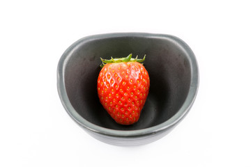 red strawberry on white background
