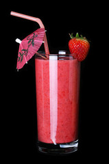 healthy glass of smoothies strawberry flavor on black background