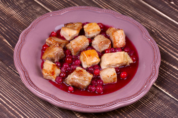 Fried pork with cranberry and wine sauce