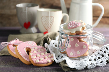 Heart shaped cookies for valentines day, teapot and cups