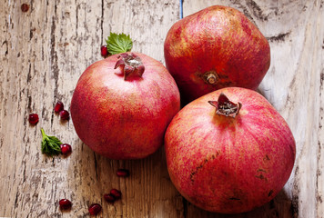 pomegranate with seeds and leaves