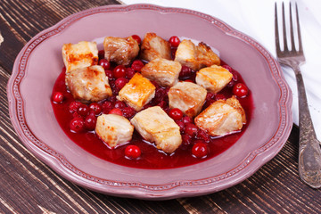Fried pork with cranberry and wine sauce