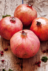pomegranate with seeds and leaves