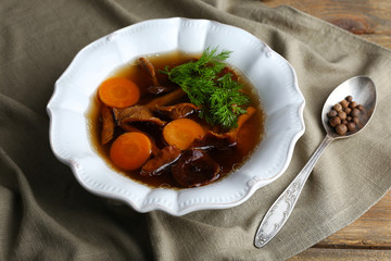 Mushroom soup on napkin, closeup
