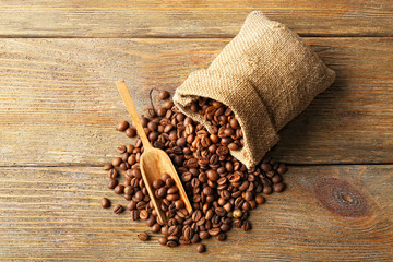 Coffee beans on wooden background