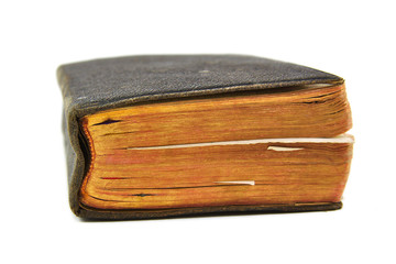 Old book with slightly unfocused back on a white background