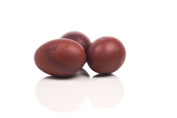 three red colored eggs