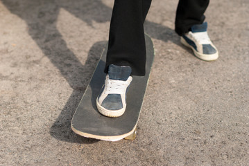 Boy on a skateboard sneakers.