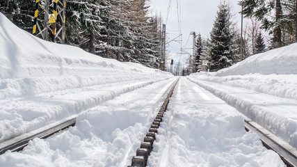 free railway in winter time in mountains