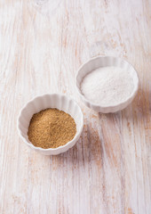 salt and pepper on wooden table
