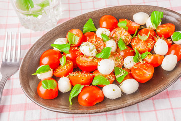 salad with tomatoes, mozzarella and fresh basil