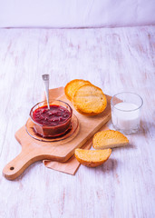 Toasts with Strawberry Jam on the kitchen board