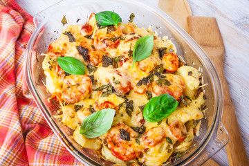 potato casserole with tomatoes and cheese
