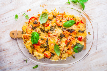 potato casserole with tomatoes and cheese