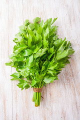 lovage leaves on a wooden table