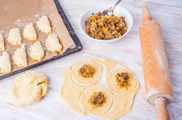 ingredients to prepare the dumplings on a white kitchen table