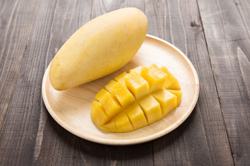 Mango on a wood background