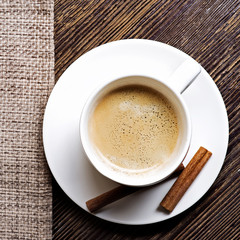 Cup of coffee on a wooden table