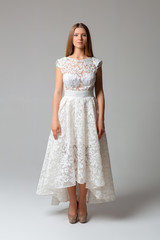 Fototapeta premium Young woman in a white dress