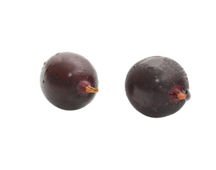 juicy black currant on a white background