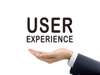 user experience words holding by businessman's hand