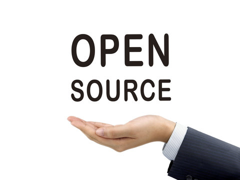 open source word holding by businessman's hand