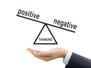 thinking negative holding by businessman's hand