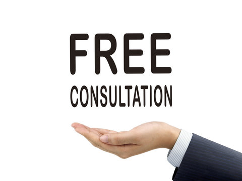 free consultation words holding by businessman's hand