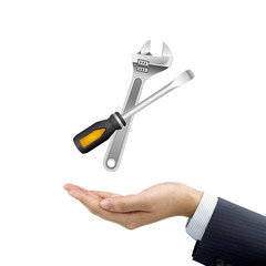 businessman's hand holding tools