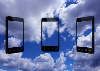 smart-phones transparent on the blue sky background