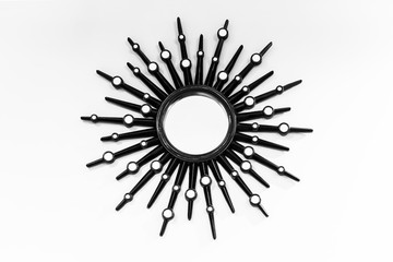 Decorative wooden mirror on the wall interior detail
