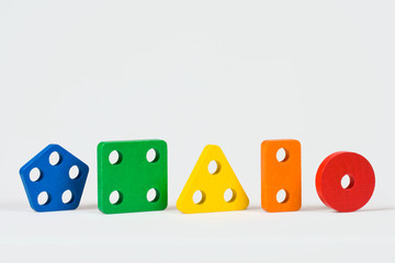 Wooden baby blocks in five colors