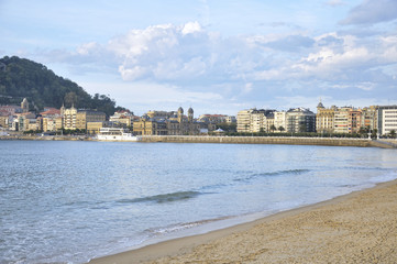 Fototapeta na wymiar View of a beach and the city of San Sebastian, Spain