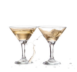 two wine swirling in a goblet martini glass, isolated