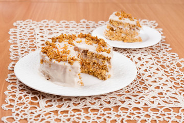 carrots and pumpkin cake with coffee cream in a cut