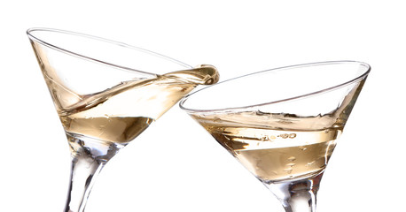 two wine swirling in a goblet martini glass, isolated